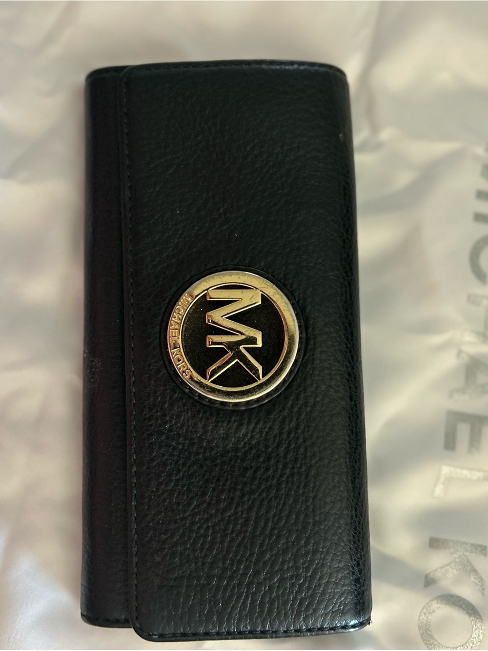 30%off Michael Kors Black Leather Trifold Wallet with Gold MK Medallion